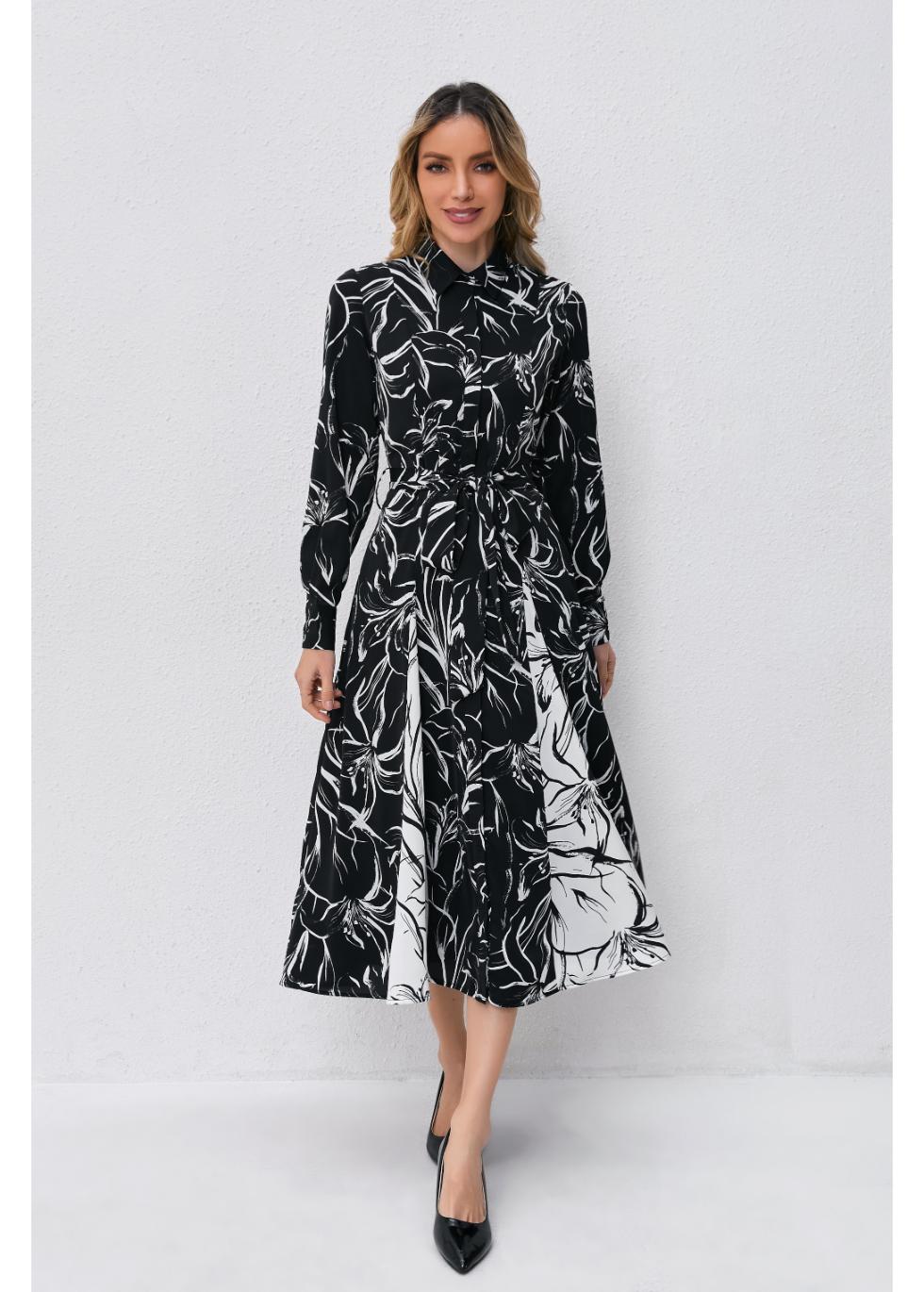 MissFinchNYC monochrome bloom midi dress featuring a floral pattern and elegant silhouette, displayed on a mannequin.