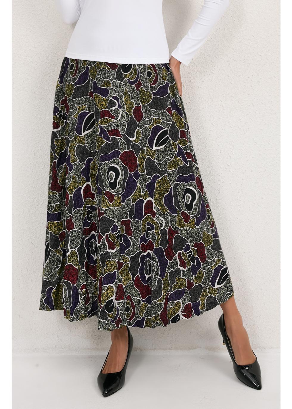 Gray Mystic Petal Midi Skirt by MissFinchNYC, flowing fabric with a floral petal design, shown on a model.