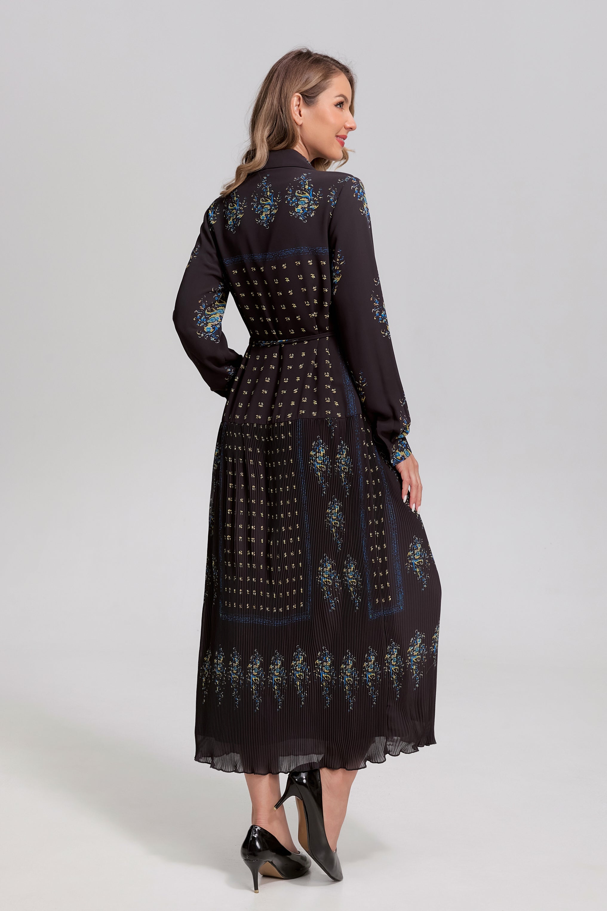 Black and blue noir mosaic button-front midi dress by MissFinchNYC, featuring a stylish pattern and elegant midi length.