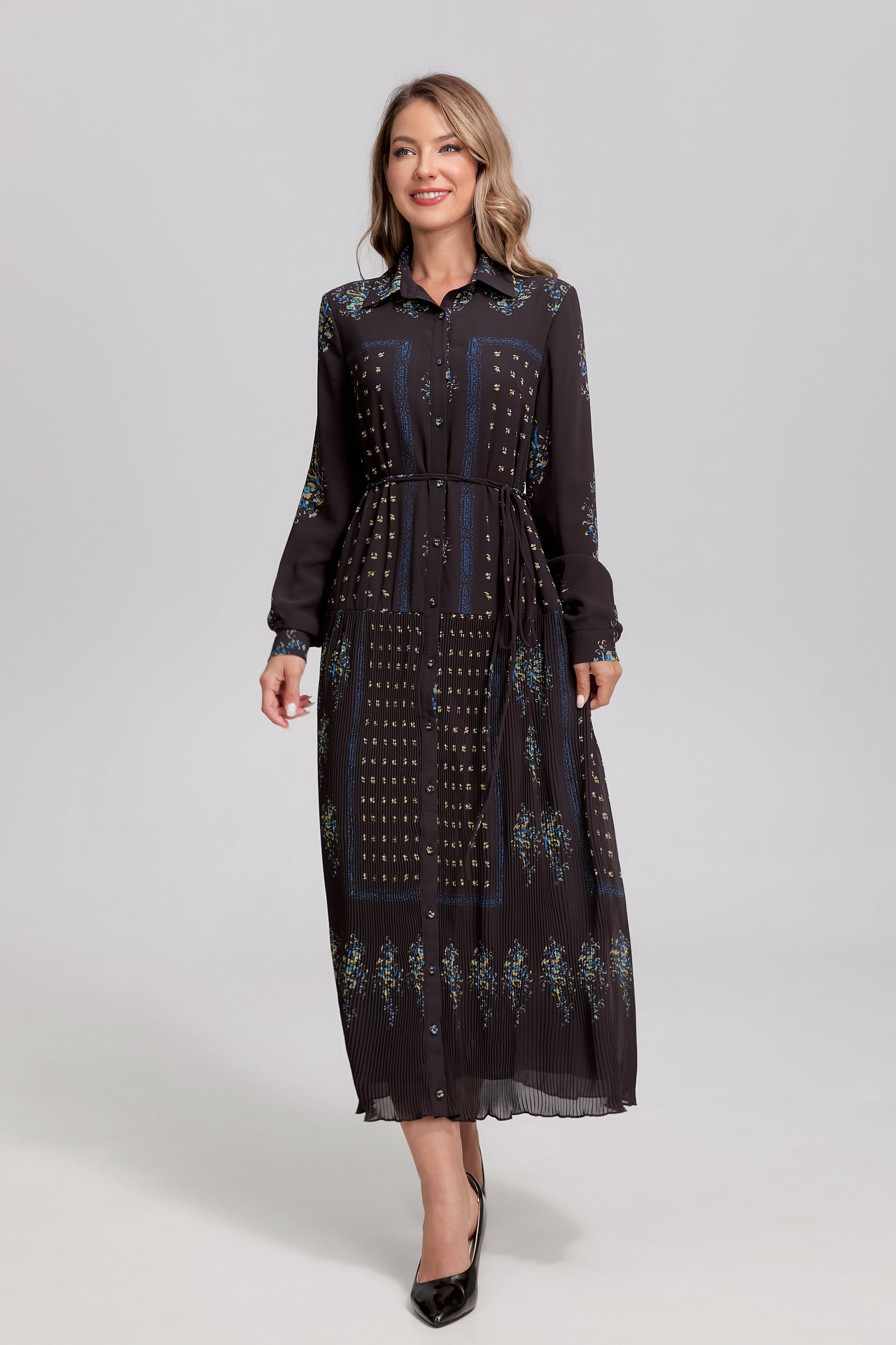 Black and blue Noir Mosaic button-front midi dress by MissFinchNYC, featuring a fitted waist and elegant midi length.