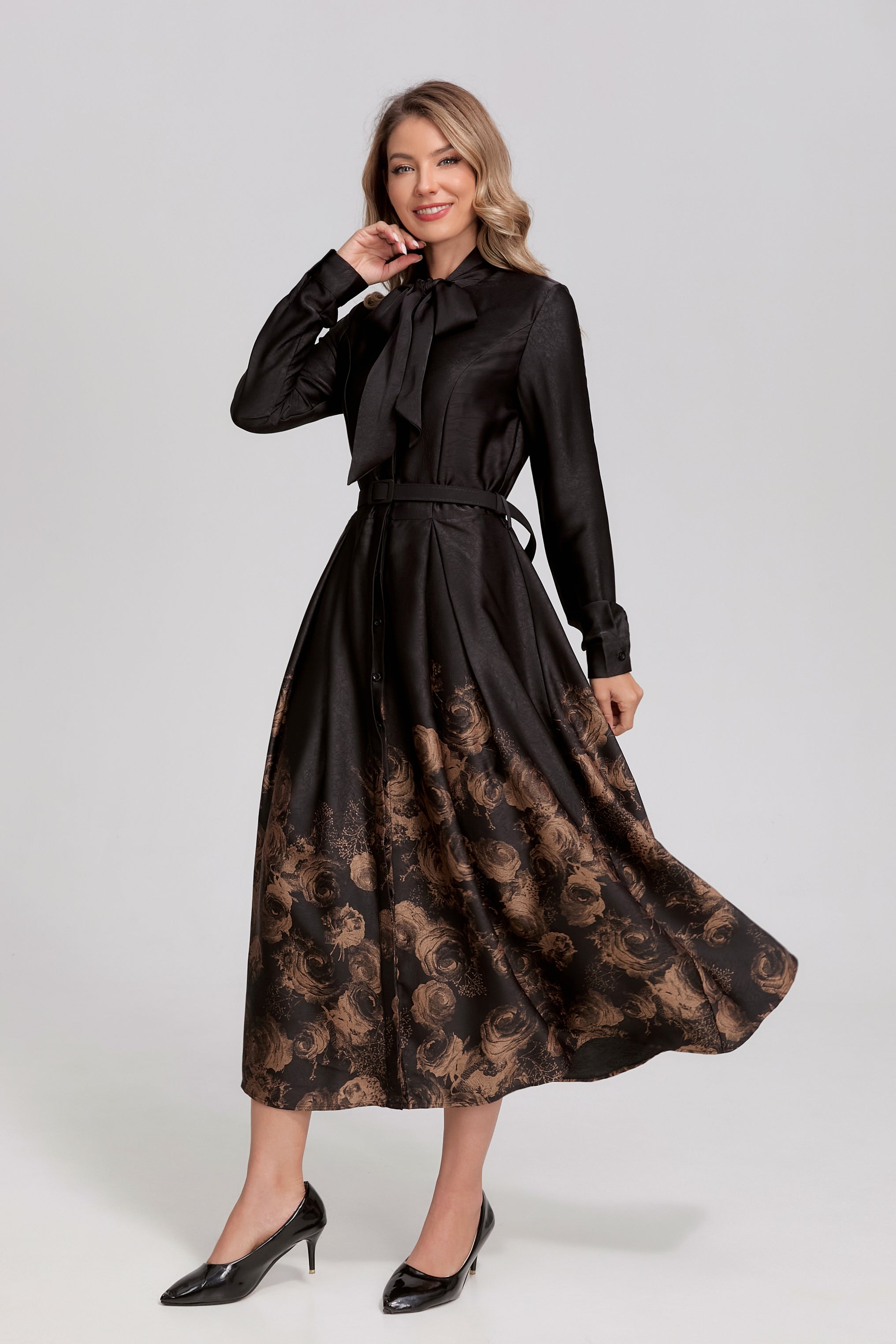 Black Noir Rosewood Tie-Neck Midi Dress by MissFinchNYC, featuring a sleek design, tie-neck detail, and elegant midi length.