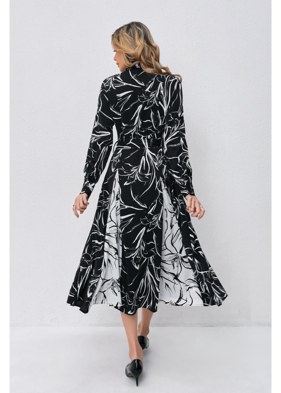 MissFinchNYC Monochrome Bloom Midi Dress displayed on a model, featuring a sleek, elegant design with floral print and midi length.
