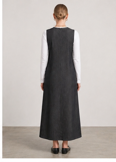 Black denim midi dress by MissFinchNYC, back view showing fitted waist and flowing skirt in a stylish dress for women.