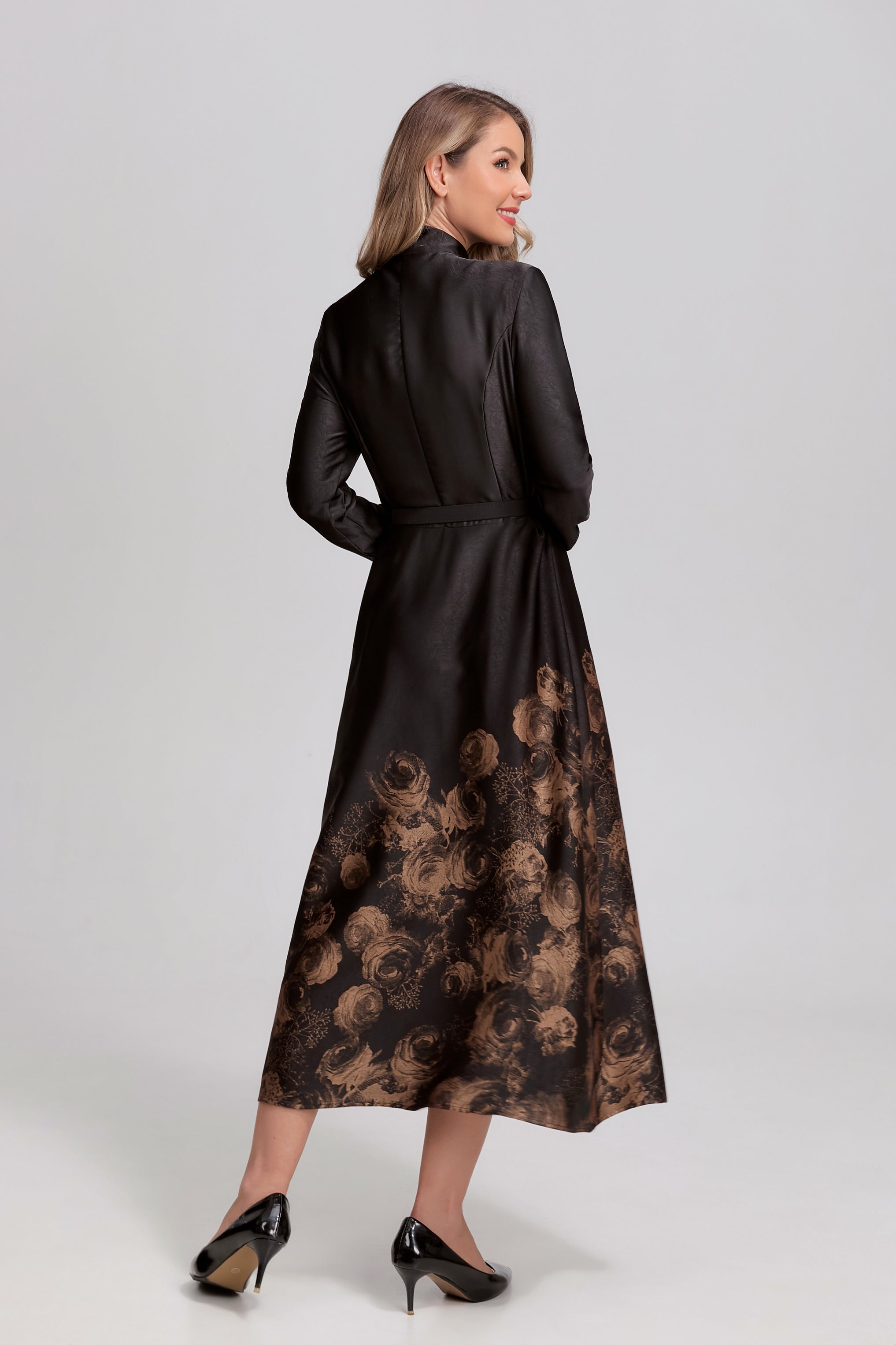 Black Noir Rosewood Tie-Neck Midi Dress by MissFinchNYC, showcasing elegant design and gold accents in a stylish dress image.